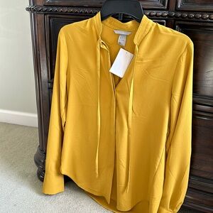 Yellow blouse or shirt